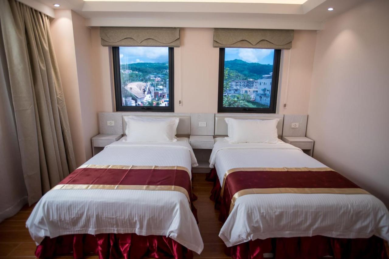 Hotel Americano Garapan Bagian luar foto